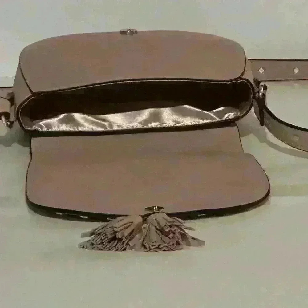 A Victoria’s Secret light pink crossbody bag w/ tassels. - Picture 5 of 9